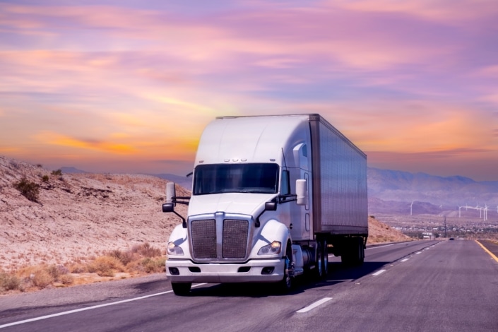 commercial moving truck driving on arizona highway