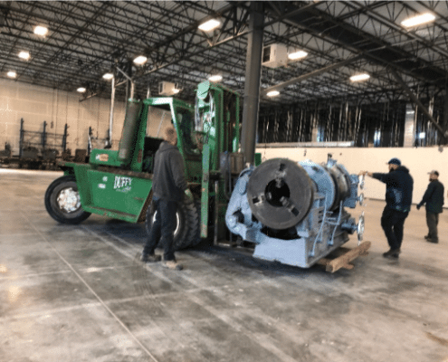 moving heavy equipment during an industrial relocation