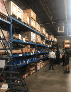 project managers overseeing warehouse layout alteration