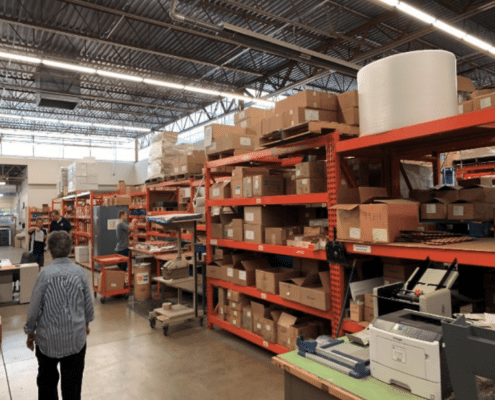 employees working during warehouse layout alteration