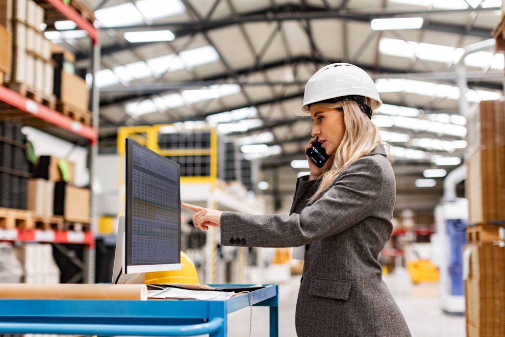 Female,Engineer,,Project,Manager,Standing,In,Modern,Industrial,Factory,By